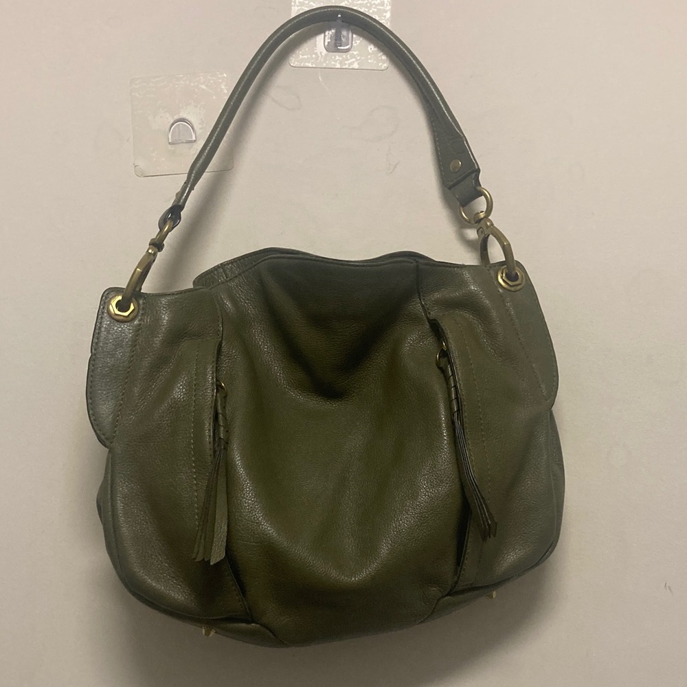 Olive Green Leather Shoulder Bag. Two outside pockets; magnetic closure